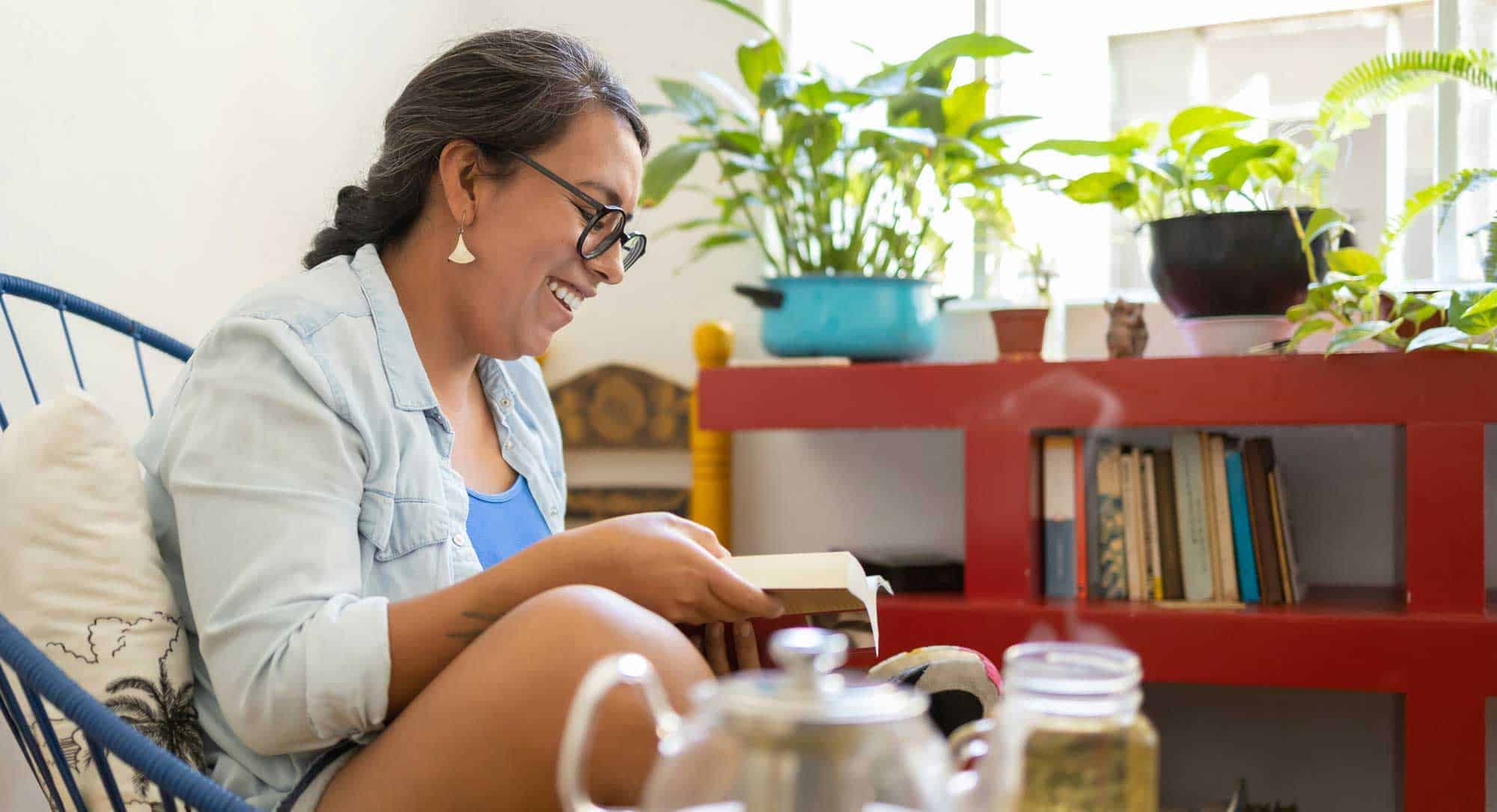 A woman reading at home